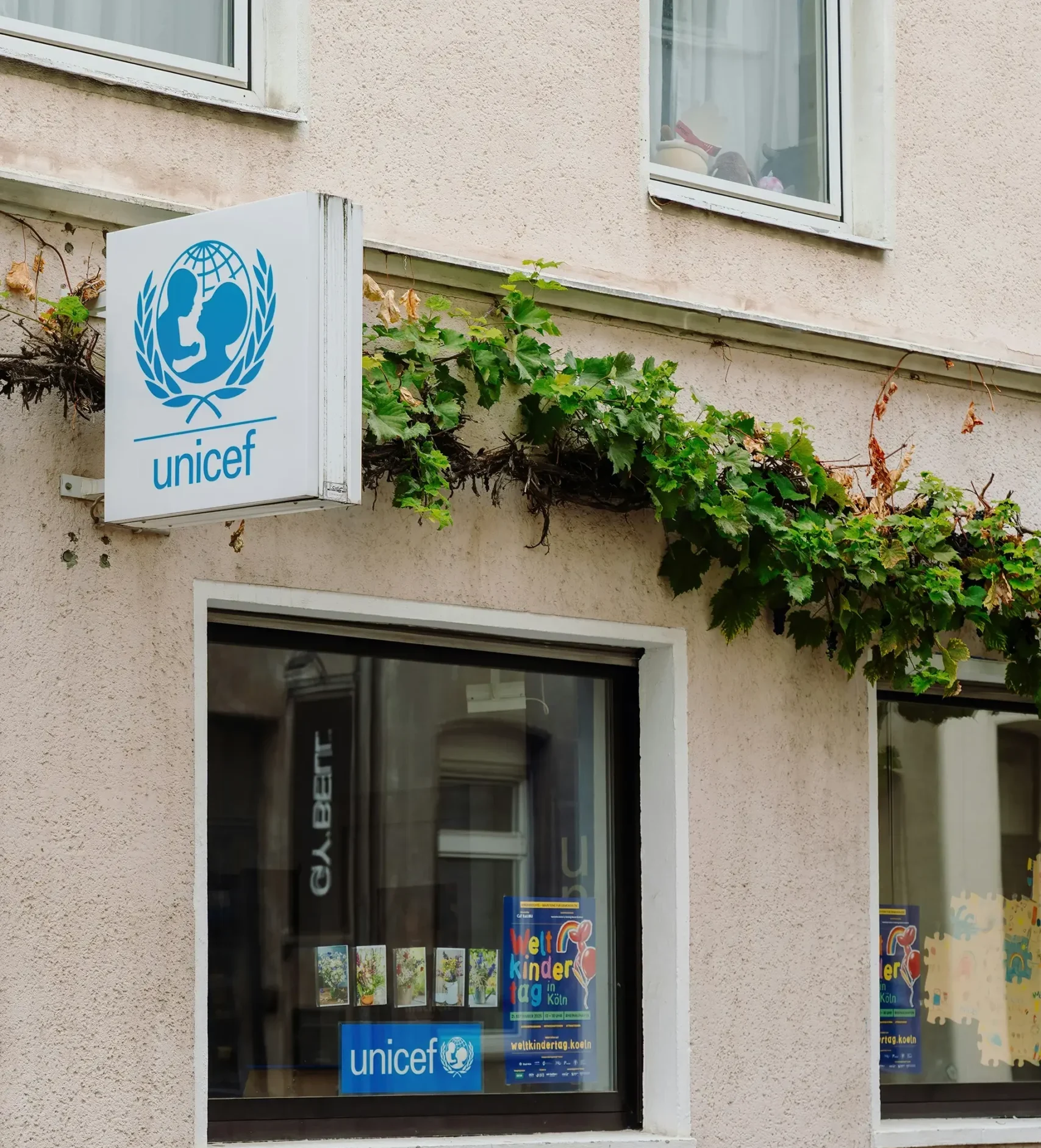 The front of house with unicef signage